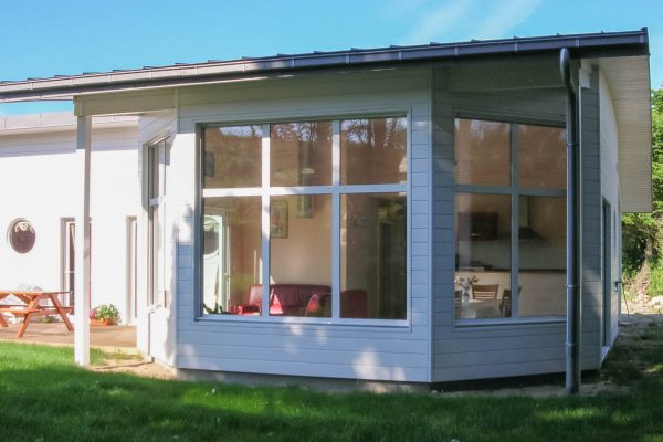 Maison ossature bois, bow - window , toiture courbe